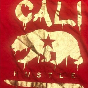 CALI HUSTLE gold lettering drip T-shirt